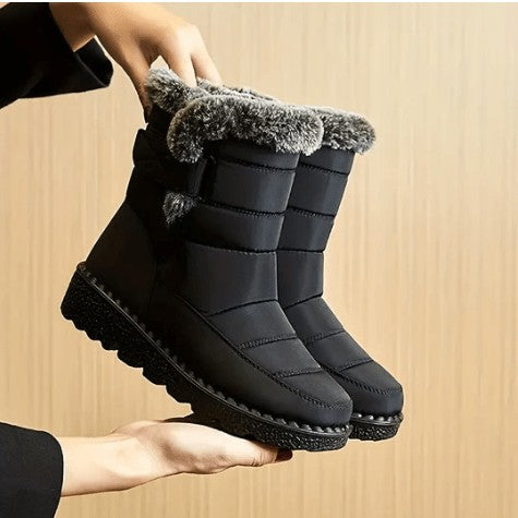 Gesteppte Damen-Winterstiefel mit Kunstfellrand, Warmfutter und Antirutschsohle für Schnee und Regen in Schwarz