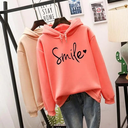 Damen-Hoodie mit Smile-Print, Kapuze mit Tunnelzug und Rippbündchen in Orangerot
