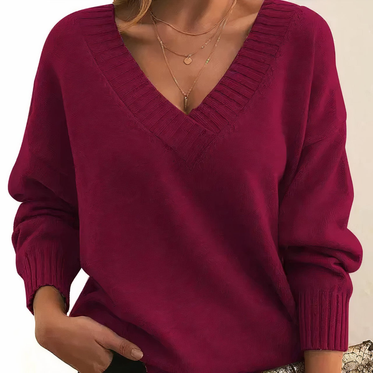 Damen-Kaschmirpullover mit breitem V-Ausschnitt und überschnittenen Schultern in Rot