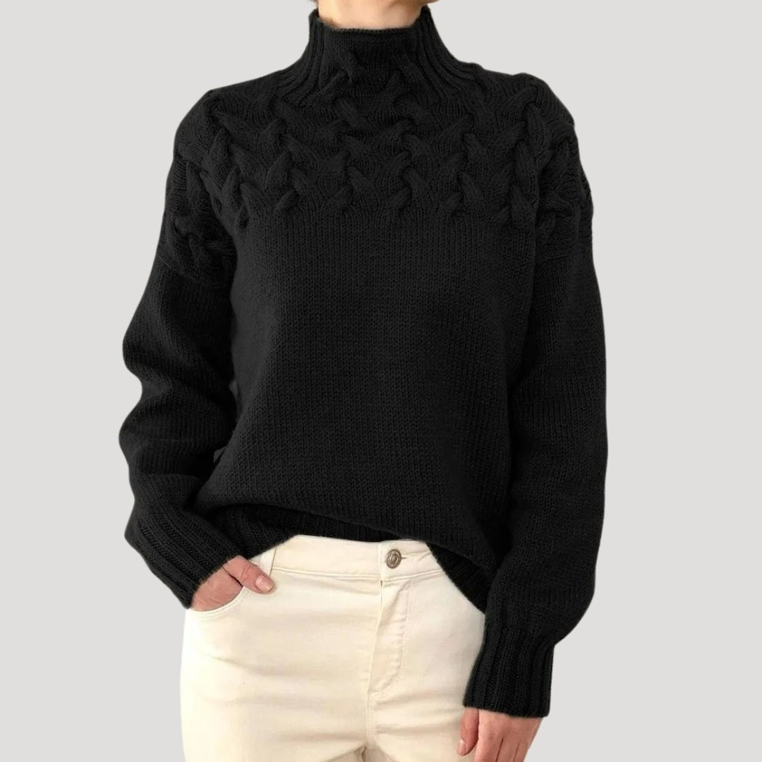 Damen-Rollkragenpullover mit Zopfmuster an der Passe und lockerer Passform in Schwarz