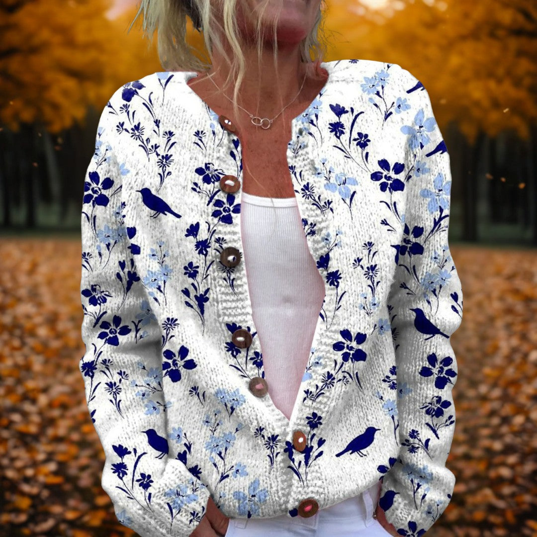 Helle Damen-Strickjacke mit blauem Blumen- und Vogelmuster und Knopfleiste
