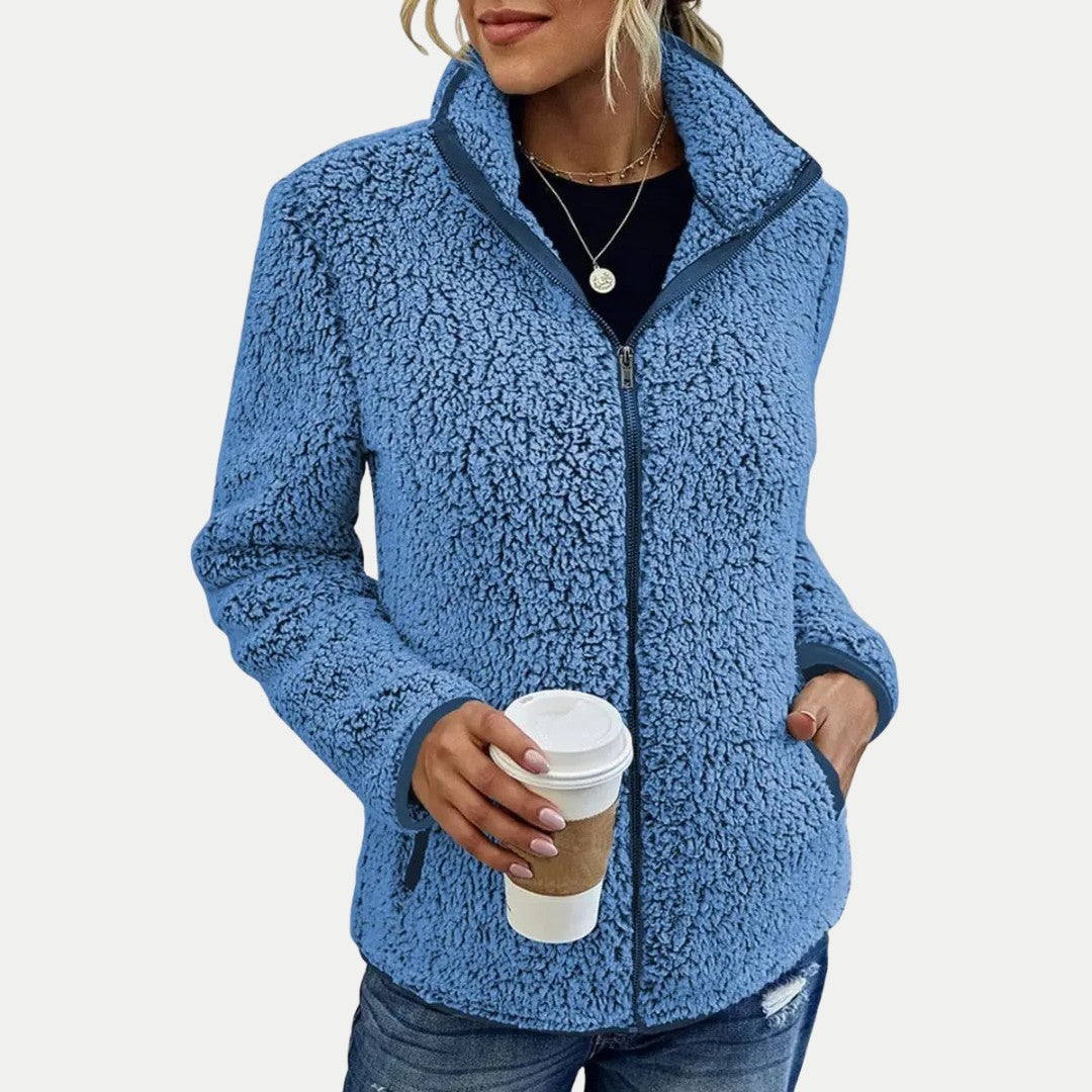Damen-Teddyfleecejacke mit Stehkragen, durchgehendem Reißverschluss und Seitentaschen in Blau