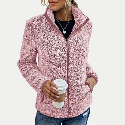 Damen-Teddyfleecejacke mit Stehkragen, durchgehendem Reißverschluss und Seitentaschen in Pink