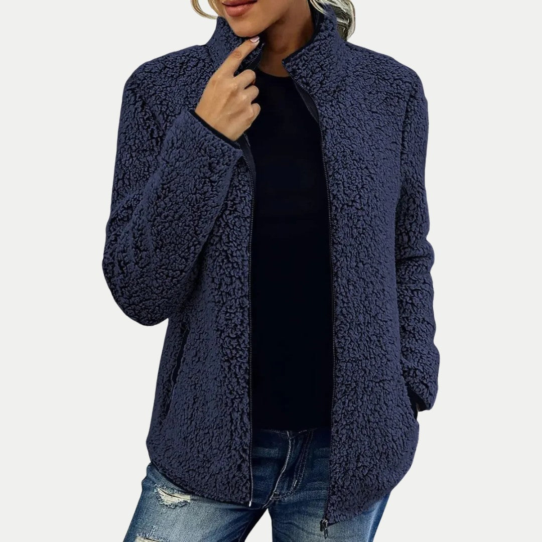 Damen-Teddyfleecejacke mit Stehkragen, durchgehendem Reißverschluss und Seitentaschen in Navyblau