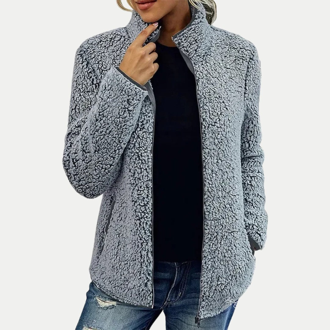 Damen-Teddyfleecejacke mit Stehkragen, durchgehendem Reißverschluss und Seitentaschen in Grau