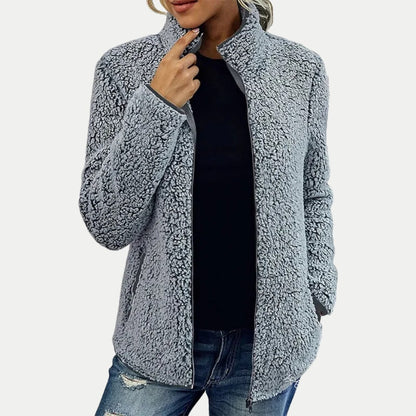 Damen-Teddyfleecejacke mit Stehkragen, durchgehendem Reißverschluss und Seitentaschen in Grau