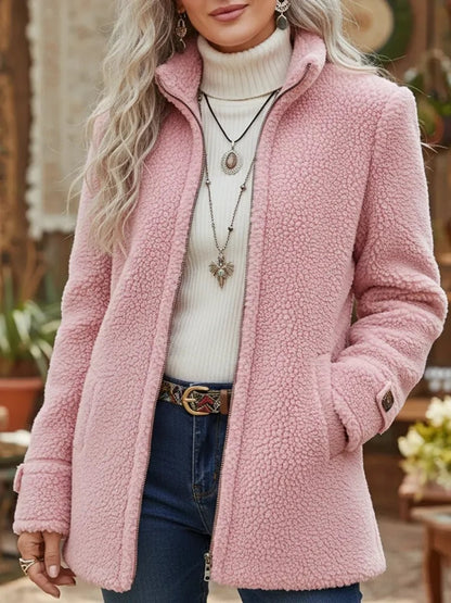 Damen-Teddyjacke mit Stehkragen, durchgehendem Reißverschluss und Seitentaschen in Pink