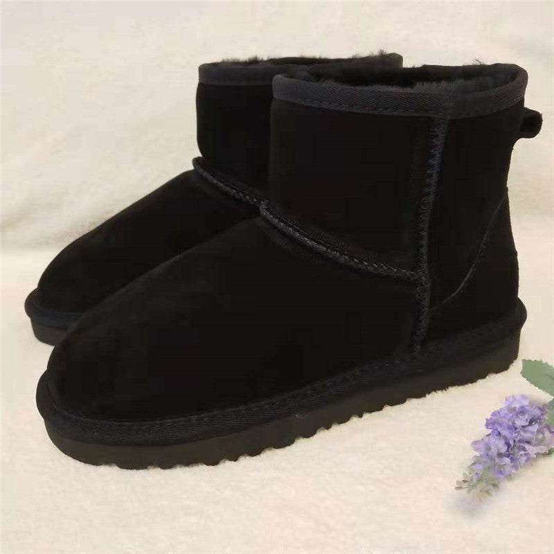 Damen-Winterboots aus Leder mit warmem Futter in Knöchelhöhe zum Hineinschlüpfen in Schwarz