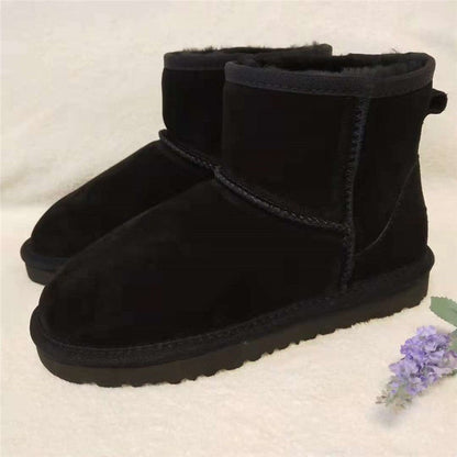 Damen-Winterboots aus Leder mit warmem Futter in Knöchelhöhe zum Hineinschlüpfen in Schwarz