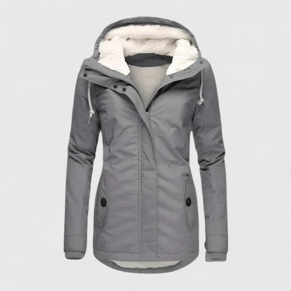 Damen-Winterjacke mit Teddyfutter in der Kapuze, verstellbarer Kapuze und Pattentaschen in Grau