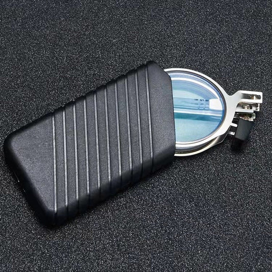 Gefaltete runde Lesebrille in einem schwarzen Etui