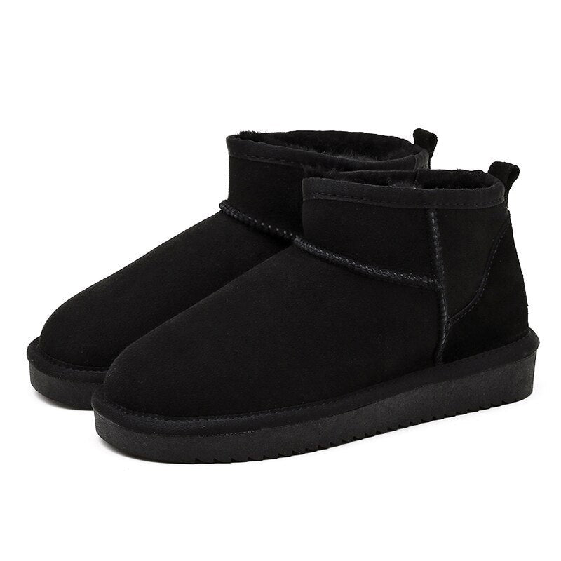 Gefütterte Damen-Stiefeletten zum Hineinschlüpfen mit wasserabweisendem Obermaterial und Antirutschsohle in Schwarz