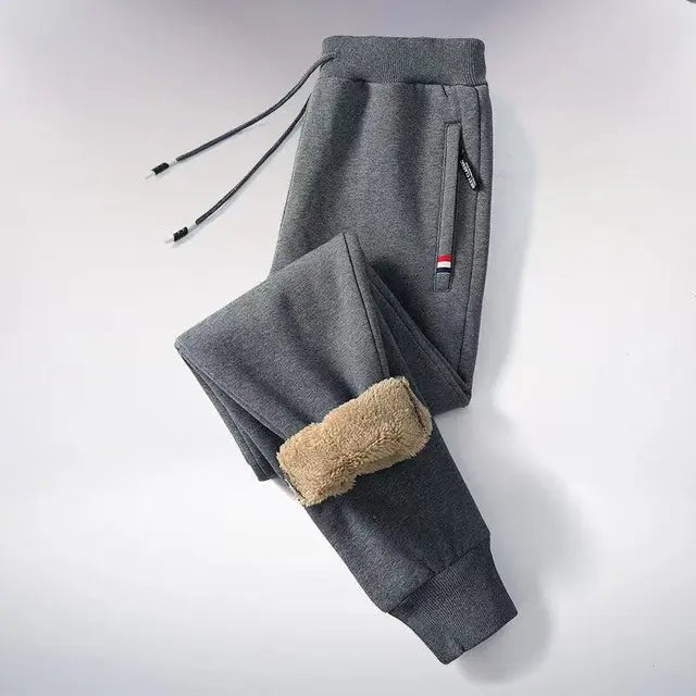Gefütterte Jogginghose für Herren mit Teddyfleece-Innenfutter, Kordelzug und Reißverschlusstaschen in Schwarz 1
