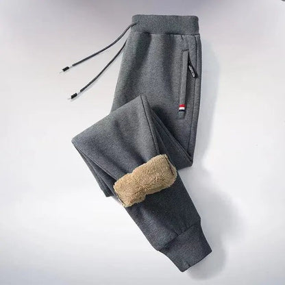 Gefütterte Jogginghose für Herren mit Teddyfleece-Innenfutter, Kordelzug und Reißverschlusstaschen in Schwarz 1