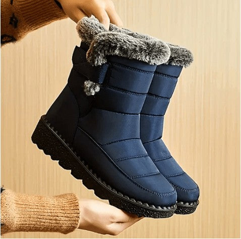 Gesteppte Damen-Winterstiefel mit Kunstfellrand, Warmfutter und Antirutschsohle für Schnee und Regen in Blau