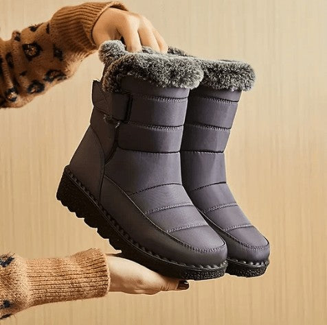 Gesteppte Damen-Winterstiefel mit Kunstfellrand, Warmfutter und Antirutschsohle für Schnee und Regen in Grau