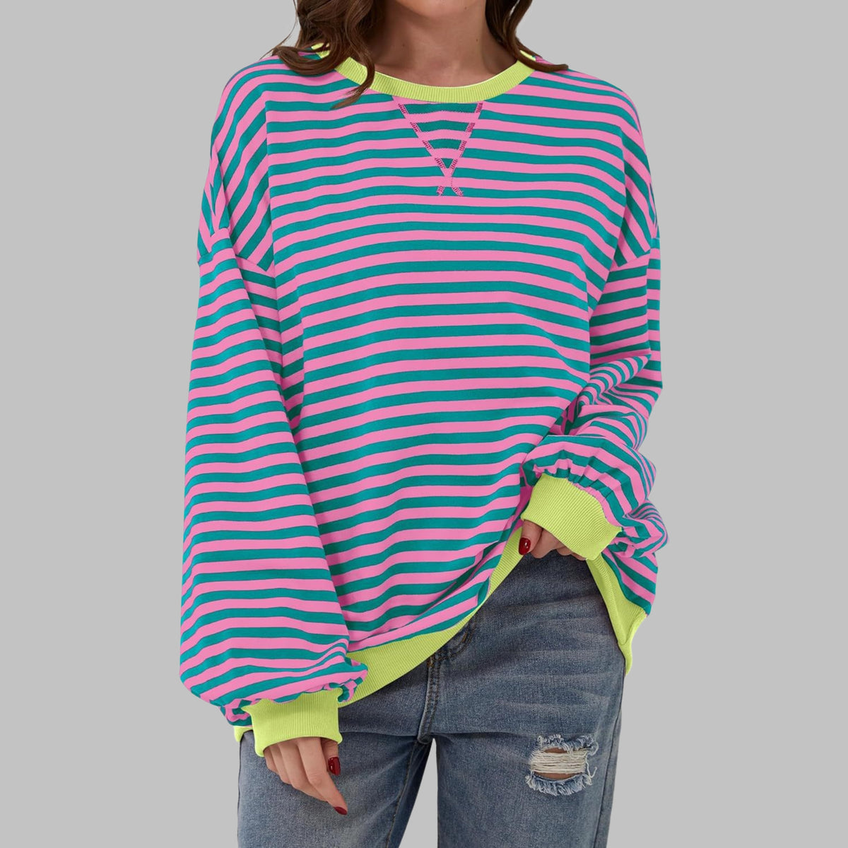 Gestreiftes Oversized Damen-Sweatshirt mit Rundhals und kontrastfarbenen Rippbündchen in Rosa