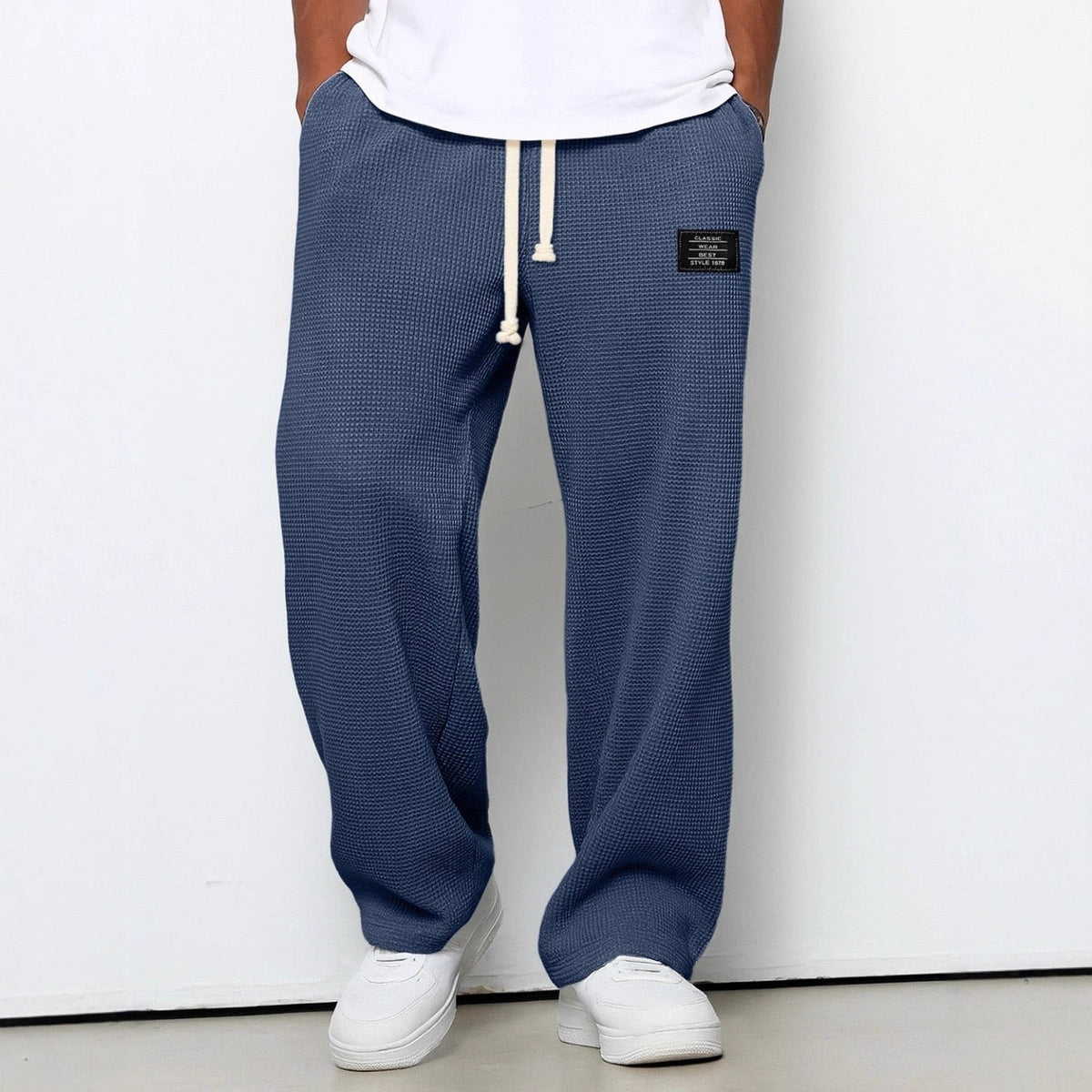 Herren-Hose mit Waffelstruktur, Kordelzug und geradem weitem Bein für Freizeit und Alltag in Blau