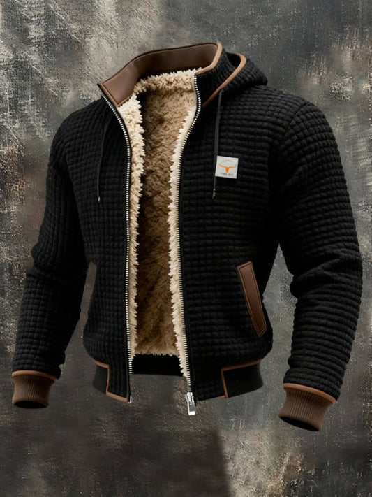 Herren-Jacke in Waffelstruktur mit Teddyfutter, Kapuze und Rippbündchen in Schwarz