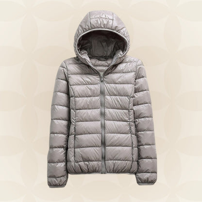 Leichte Damen-Steppjacke mit Kapuze und Reißverschluss für die Übergangszeit in Grau