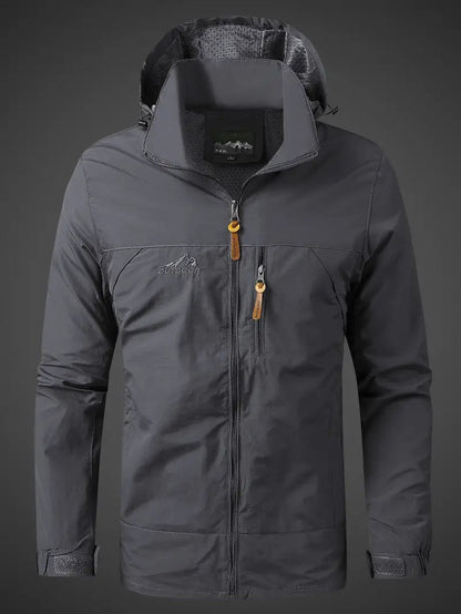 Leichte Herren-Outdoorjacke mit Kapuze, Stehkragen und Brusttasche für Wind und leichten Regen in Grau