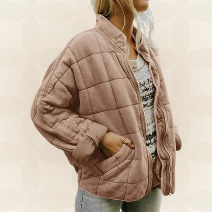 Lockere Damen-Steppjacke mit Stehkragen, Reißverschluss und tiefen Taschen in Beige