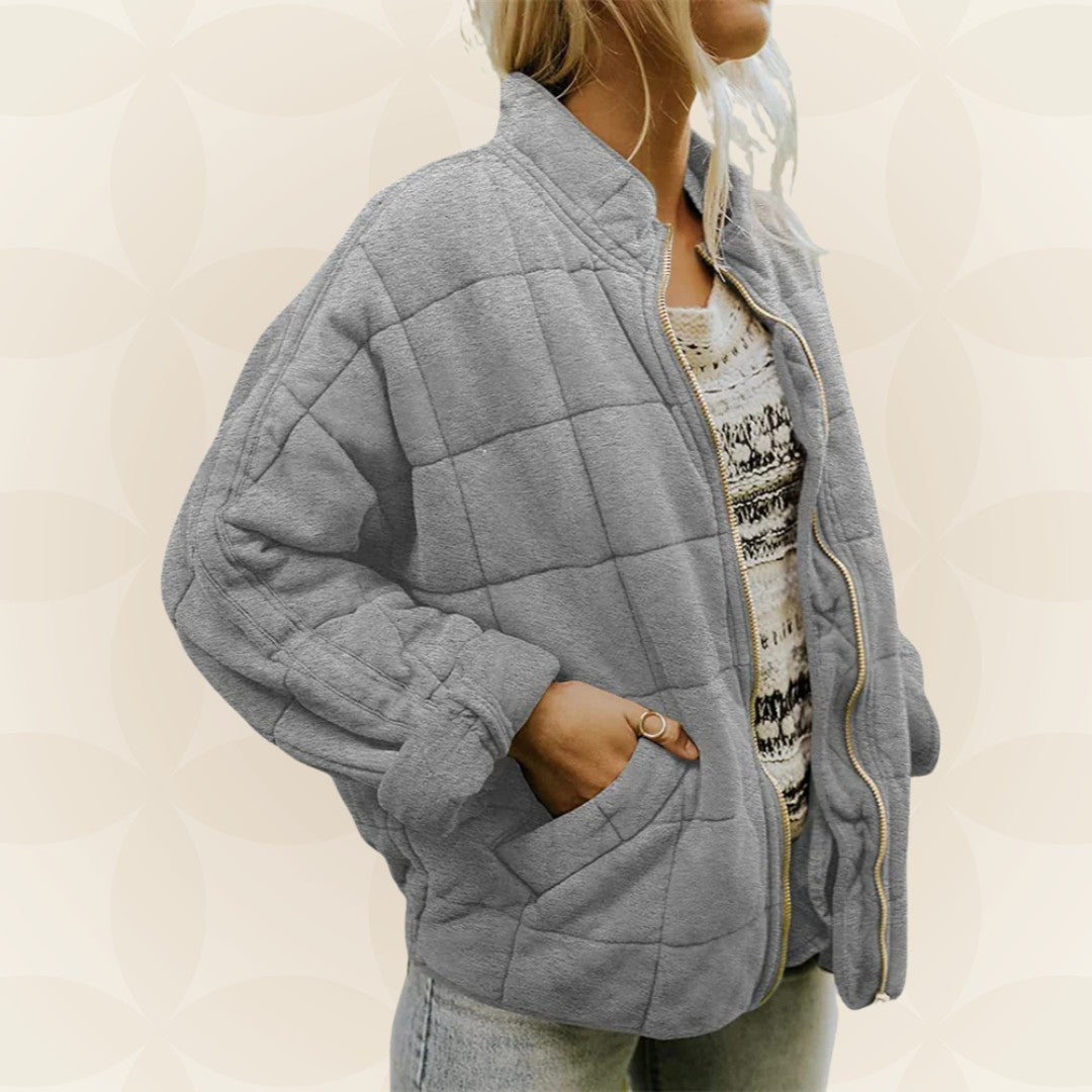 Lockere Damen-Steppjacke mit Stehkragen, Reißverschluss und tiefen Taschen in Grau