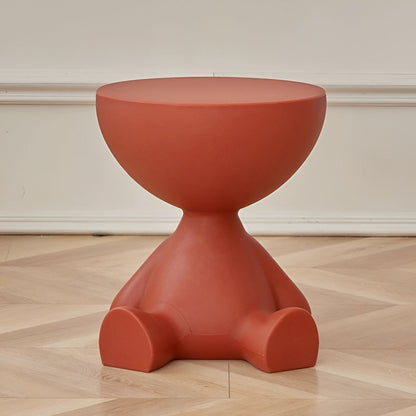 Runder Beistelltisch aus Kunststoff in Figurenform als Couchtisch oder Dekotisch in Rot