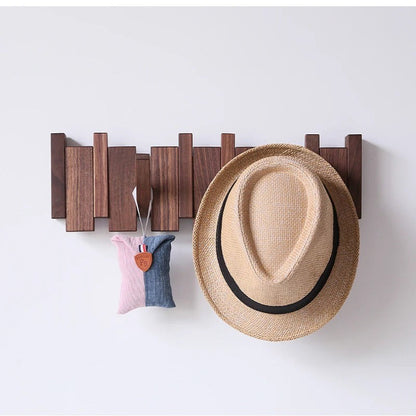 Wandgarderobe aus Massivholz im Klaviertasten-Design mit ausklappbaren Haken, Ansicht 5