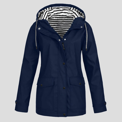 Wasserabweisende Damen-Regenjacke mit verstellbarer Kapuze, Sturmleiste und Pattentaschen in Navyblau
