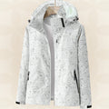 Wasserdichte Damen-Funktionsjacke mit verstellbarer Kapuze und Blätterprint