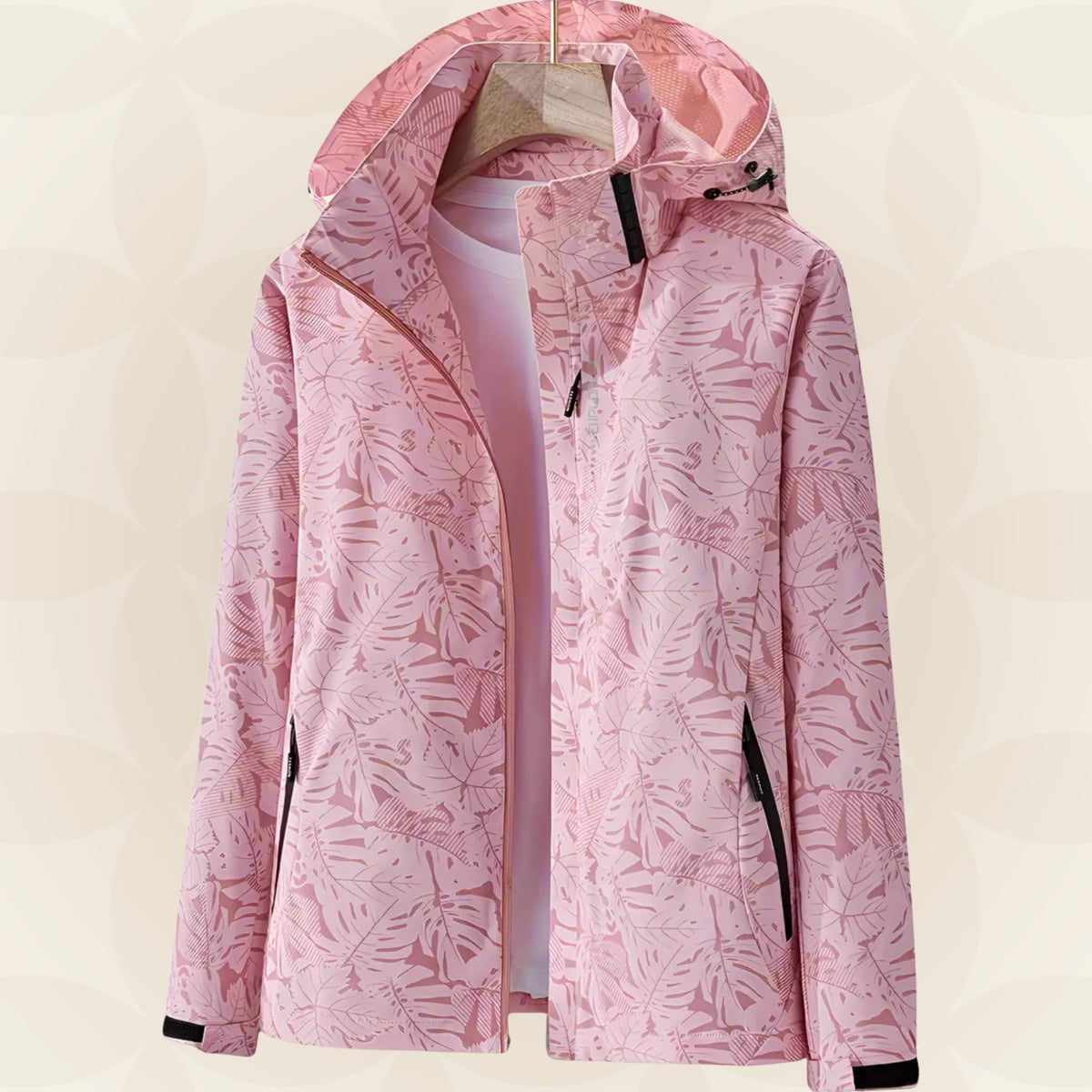 Wasserdichte Damen-Funktionsjacke mit verstellbarer Kapuze und Blätterprint in Rosa
