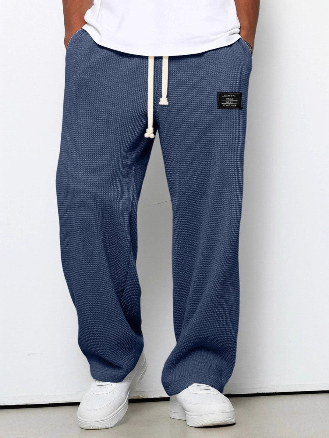 Weite Herren-Hose in Waffelstruktur mit Kordelzug und tiefen Taschen in Blau