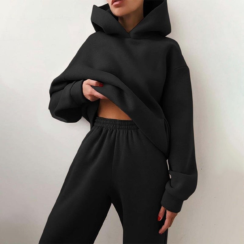 Zweiteiliges Damen-Jogginganzug-Set mit Kapuzenpullover und Jogginghose mit Gummibund in Schwarz